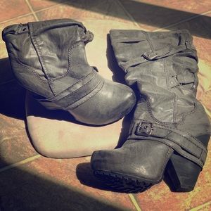 Gray high heel boots with buckles